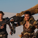 Milla Jovovich as Natalie Artemis and Tony Jaa as the Hunter.